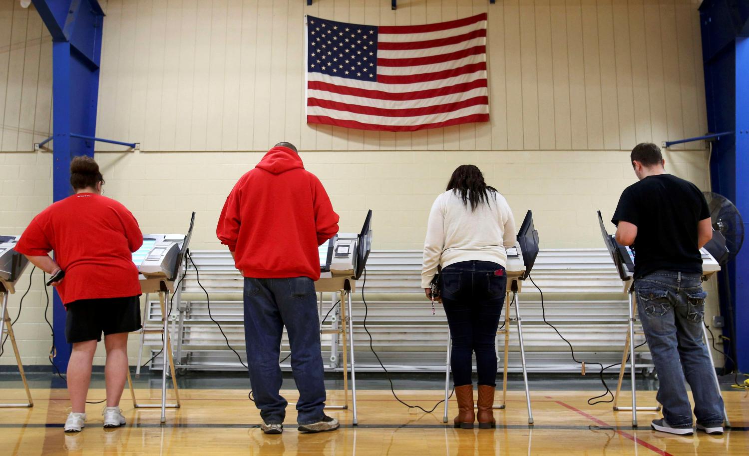 Voters cast their votes during the U.S. presidential election in Elyria, Ohio, U.S. November 8, 2016. REUTERS/Aaron Josefczyk/File Photo - TM3ECBA16K501