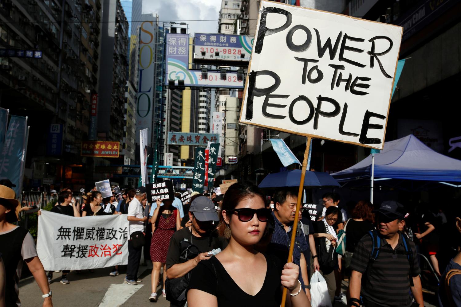 Pro-democracy activists take part in a protest on China's National Day in Hong Kong