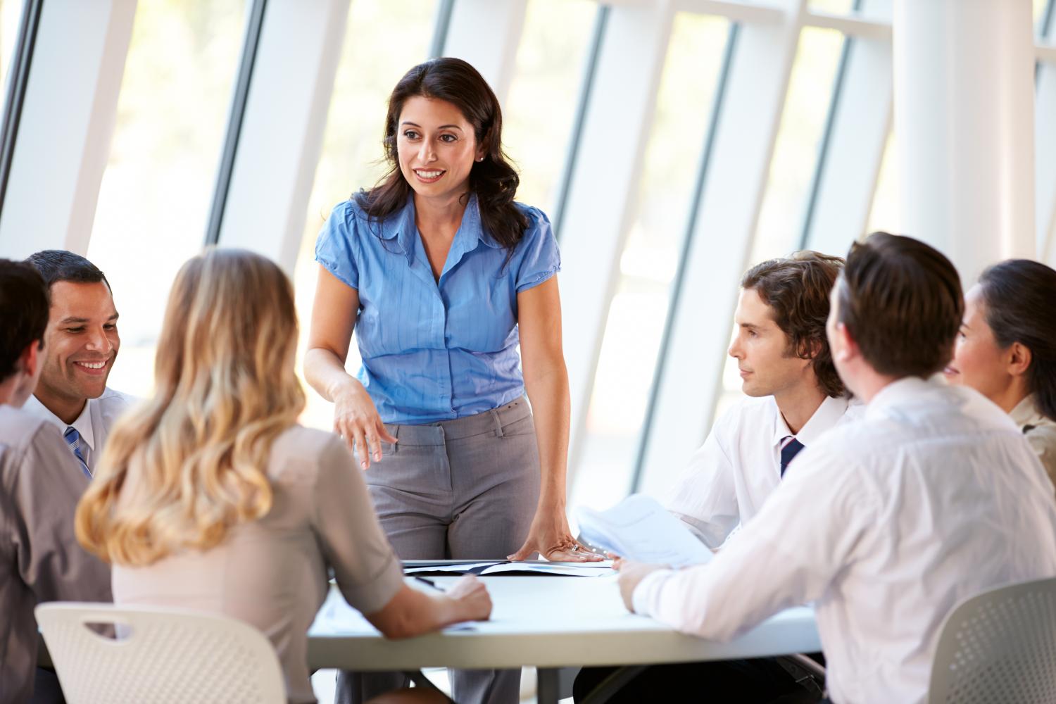 Business People Having Board Meeting In Modern Office.