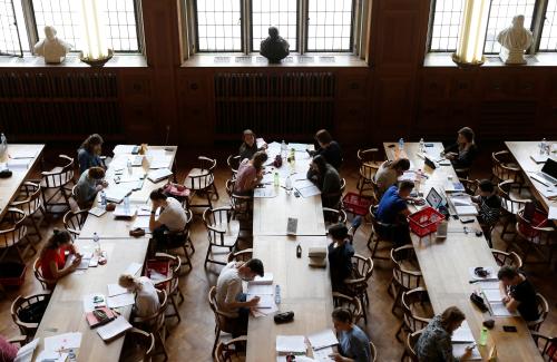 Students sit in the library of the university KU Leuven in Leuven