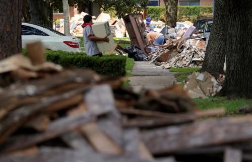 Photo: Giant mounds of trash from Hurricane Harvey flood damaged homes lines the sidewalks in Houston