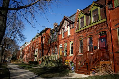 Row houses are seen in the historic Pullman neighborhood in Chicago November 20, 2014. U.S. President Barack Obama is expected to announce the designation of the Pullman neighborhood as a national park on February 19, according to park advocates. The neighborhood's brick homes and ornate public buildings were built in the 1800s by industrialist George Pullman as a blue-collar utopia to house workers from his sleeper car factory. Picture taken November 20, 2014. REUTERS/Andrew Nelles (UNITED STATES - Tags: SOCIETY ENVIRONMENT POLITICS) - TM3EABN1EN001