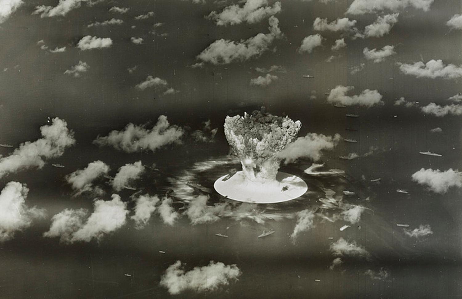 A mushroom cloud rises with ships below during Operation Crossroads nuclear weapons test on Bikini Atoll, Marshall Islands in this 1946 handout provided by the U.S. Library of Congress. The United States said on April 25, 2014, it was examining lawsuits filed by the Marshall Islands against it and eight other nuclear-armed countries that accuse them of failing in their obligation to negotiate nuclear disarmament. REUTERS/U.S. Library of Congress/Handout via Reuters (MARSHALL ISLANDS - Tags: POLITICS MILITARY CONFLICT) ATTENTION EDITORS - FOR EDITORIAL USE ONLY. NOT FOR SALE FOR MARKETING OR ADVERTISING CAMPAIGNS. THIS PICTURE WAS PROVIDED BY A THIRD PARTY. REUTERS IS UNABLE TO INDEPENDENTLY VERIFY THE AUTHENTICITY, CONTENT, LOCATION OR DATE OF THIS IMAGE. THIS PICTURE IS DISTRIBUTED EXACTLY AS RECEIVED BY REUTERS, AS A SERVICE TO CLIENTS - GM1EA4Q0KPN01