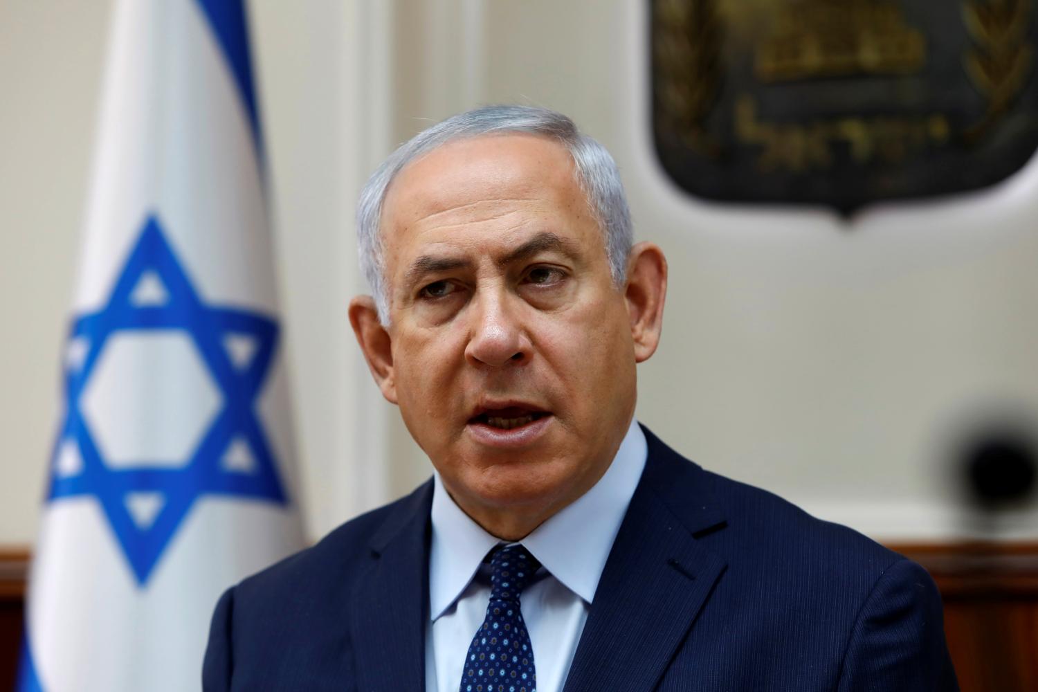 Israeli Prime Minister Benjamin Netanyahu opens the weekly cabinet meeting at his Jerusalem office September 26, 2017. REUTERS/Gali Tibbon/Pool - RC1C73A8EBF0