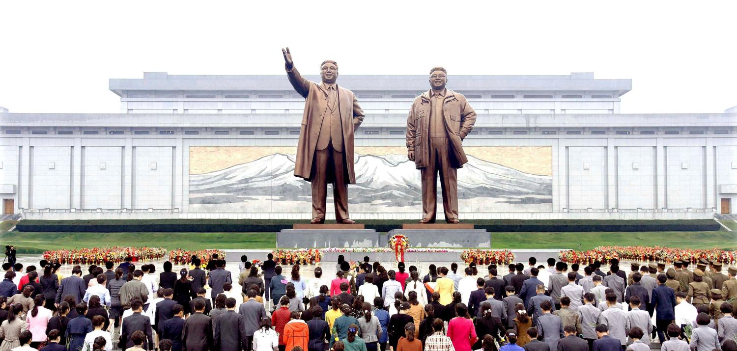 Floral tributes are paid to the statues of North Korea founder Kim Il Sung and late leader Kim Jong Il by service personnel, working people, school youth and children on the occasion of the 72nd founding anniversary of the Workers' Party of Korea (WPK) in Pyongyang, North Korea in this undated photo released by North Korea's Korean Central News Agency (KCNA) on October 10, 2017. KCNA/via REUTERS ATTENTION EDITORS - THIS PICTURE WAS PROVIDED BY A THIRD PARTY. NO THIRD PARTY SALES. SOUTH KOREA OUT. NO COMMERCIAL OR EDITORIAL SALES IN SOUTH KOREA. - RC17E383C9D0