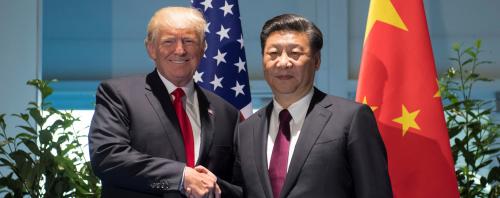 U.S. President Donald Trump and Chinese President Xi Jinping (R) shake hands prior to a meeting on the sidelines of the G20 Summit in Hamburg, Germany, July 8, 2017. REUTERS/Saul Loeb, Pool - RC1D425FD020