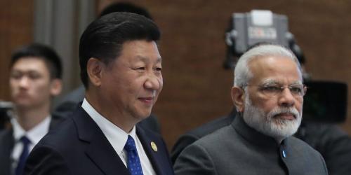 Chinese President Xi Jinping (L) and Indian Prime Minister Narendra Modi, arrive for the 'Dialogue of Emerging Market and Developing Countries' on the sidelines of the 2017 BRICS Summit in Xiamen, Fujian province, China, 05 September 2017. REUTERS/Wu Hong/Pool - RC1FB58EB2D0