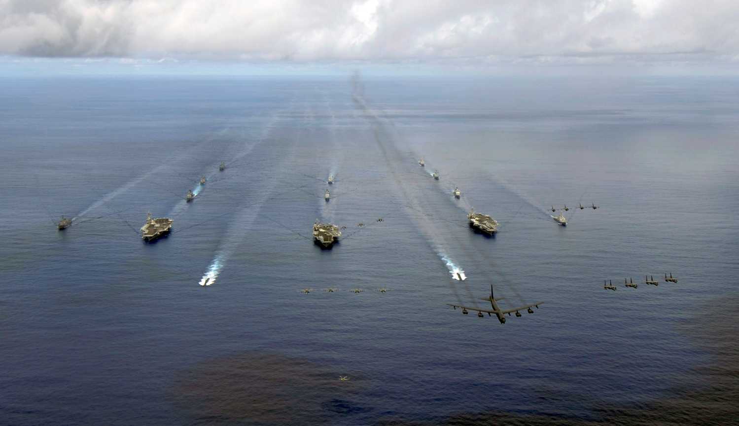 The USS Nimitz, USS Kitty Hawk and USS John C. Stennis Carrier Strike Groups transit in formation during a joint photo exercise during exercise Valiant Shield 2007 in the Pacific Ocean in this August 14, 2007 handout photo. The aerial formation consists of aircraft from the carrier strike groups as well as Air Force aircraft. Mass Communication Specialist Seaman Stephen W. Rowe/U.S. Navy/Handout via REUTERS ATTENTION EDITORS - THIS IMAGE WAS PROVIDED BY A THIRD PARTY. - RC14D1EA2880