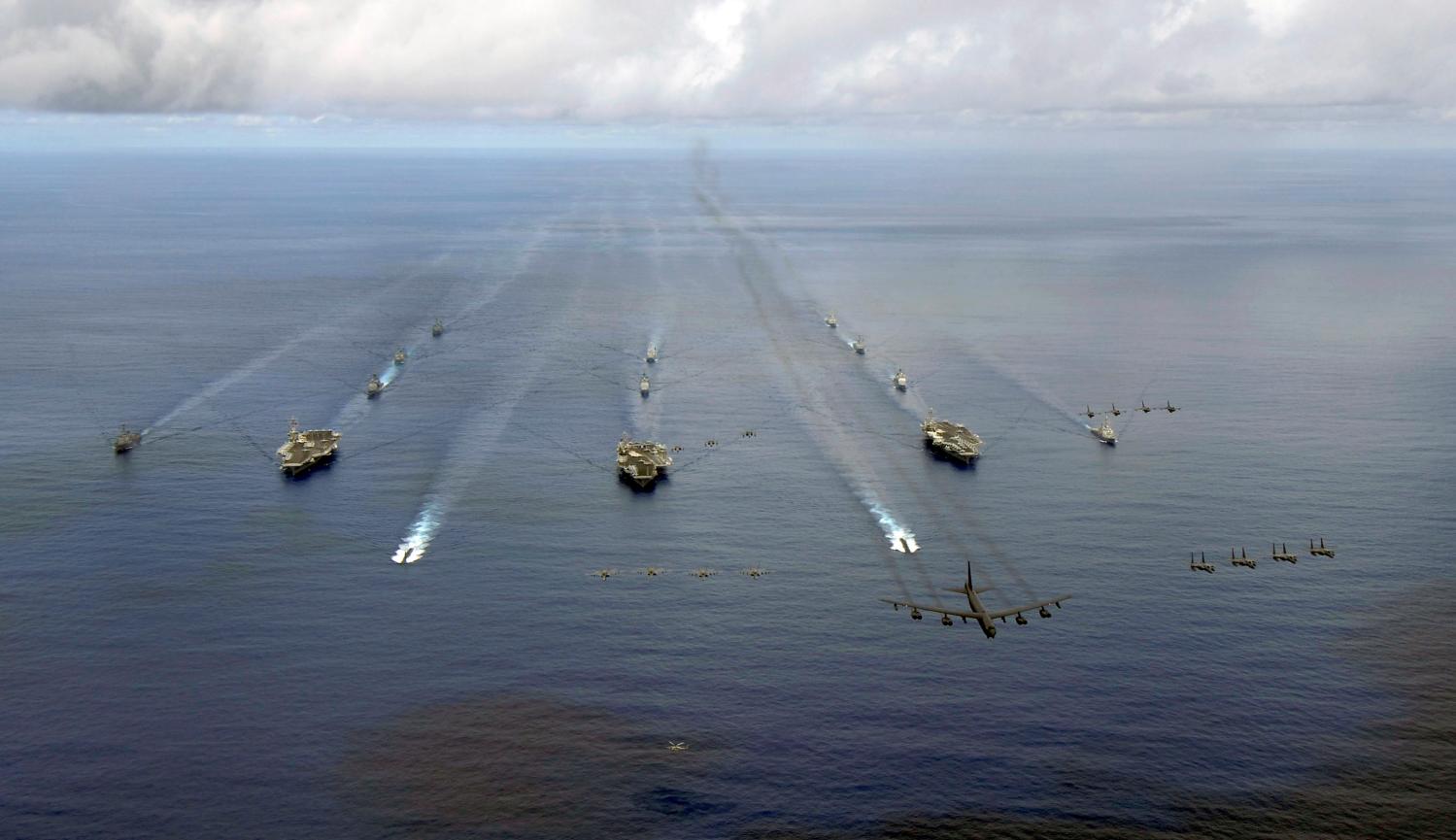 The USS Nimitz, USS Kitty Hawk and USS John C. Stennis Carrier Strike Groups transit in formation during a joint photo exercise during exercise Valiant Shield 2007 in the Pacific Ocean in this August 14, 2007 handout photo. The aerial formation consists of aircraft from the carrier strike groups as well as Air Force aircraft. Mass Communication Specialist Seaman Stephen W. Rowe/U.S. Navy/Handout via REUTERS ATTENTION EDITORS - THIS IMAGE WAS PROVIDED BY A THIRD PARTY. - RC14D1EA2880