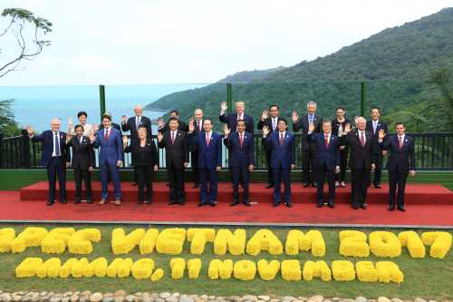 Leaders pose for a group photo at the APEC economic leaders meeting in Danang, Vietnam, November 11, 2017. (L-R): Australian Prime Minister Malcolm Turnbull; Brunei's Sultan Hassanal Bolkiah; Hong Kong Chief Executive Carrie Lam; Canadian Prime Minister Justin Trudeau; Peru's President Pedro Pablo Kuczynski; Chile's President Michelle Bachelet; Philippines President Rodrigo Duterte; China's President Xi Jinping; Russian President Vladimir Putin; Vietnamese President Tran Dai Quang; U.S. President Donald Trump; Indonesian President Joko Widodo; Thailand Prime Minister Prayuth Chan-ocha; Japanese Prime Minister Shinzo Abe; Singapore Prime Minister Lee Hsien Loong; South Korean President Moon Jae-in; New Zealand's Prime Minister Jacinda Ardern; Malaysia's Prime Minister Najib Razak; Taiwan's representative James Soong; Mexican President Enrique Pena Nieto. REUTERS/Hau Dinh/Pool - RC1B9B30FAF0