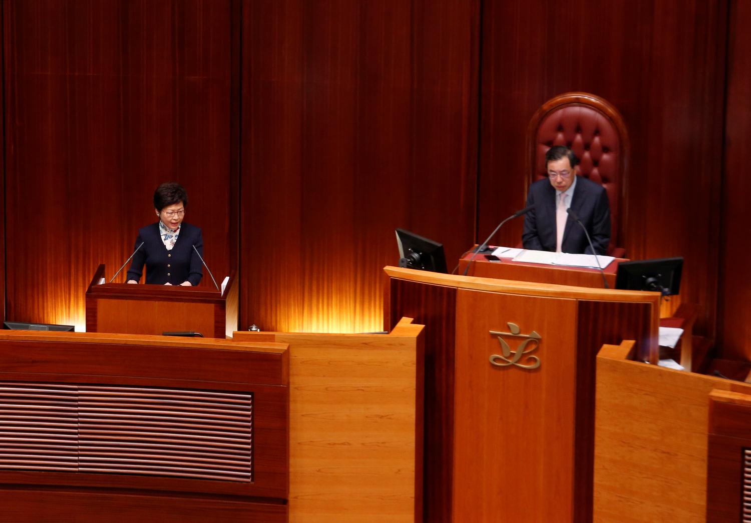 Hong Kong Chief Executive Carrie Lam (L) speaks beside Legislative Council President Andrew Leung during her first Question and Answer session at the Legislative Council in Hong Kong, China, July 5, 2017.