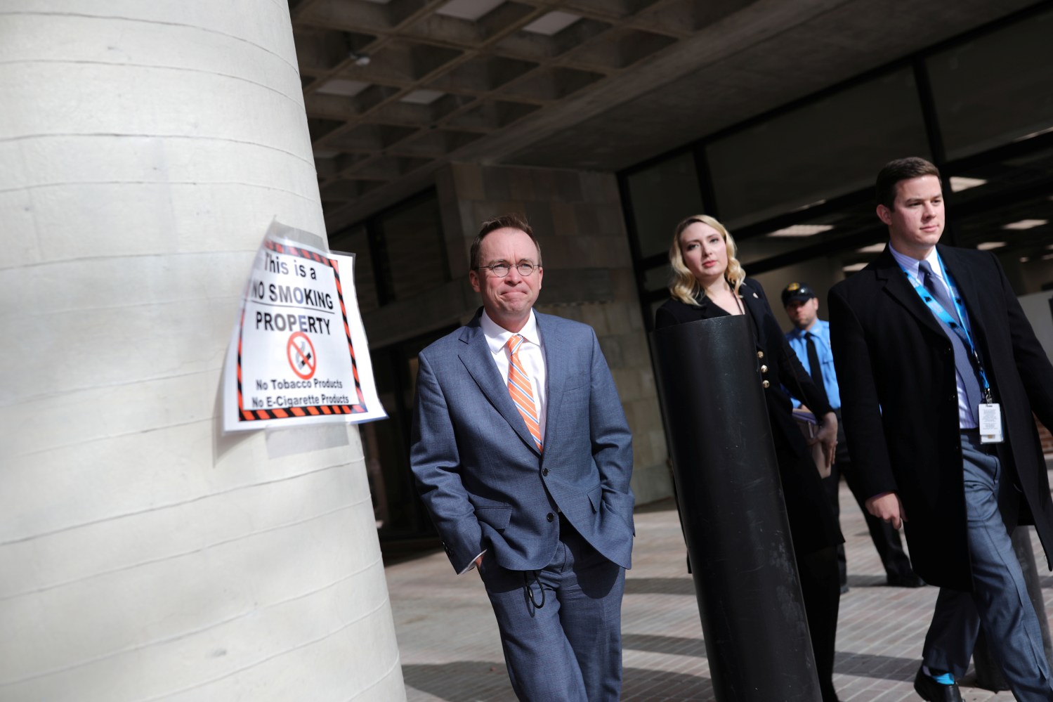 Office of Management and Budget Director Mick Mulvaney leaves the Consumer Financial Protection Bureau (CFPB) building after a meeting in downtown Washington D.C.