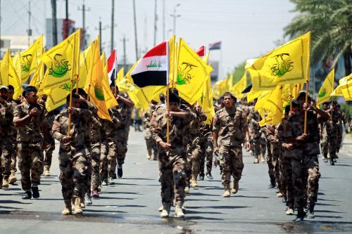 Iraqi Shi'ite Muslims from Hashid Shaabi (Popular Mobilization) march during a parade marking the annual al-Quds Day, or Jerusalem Day, in Baghdad, Iraq June 23, 2017. REUTERS/Khalid al Mousily