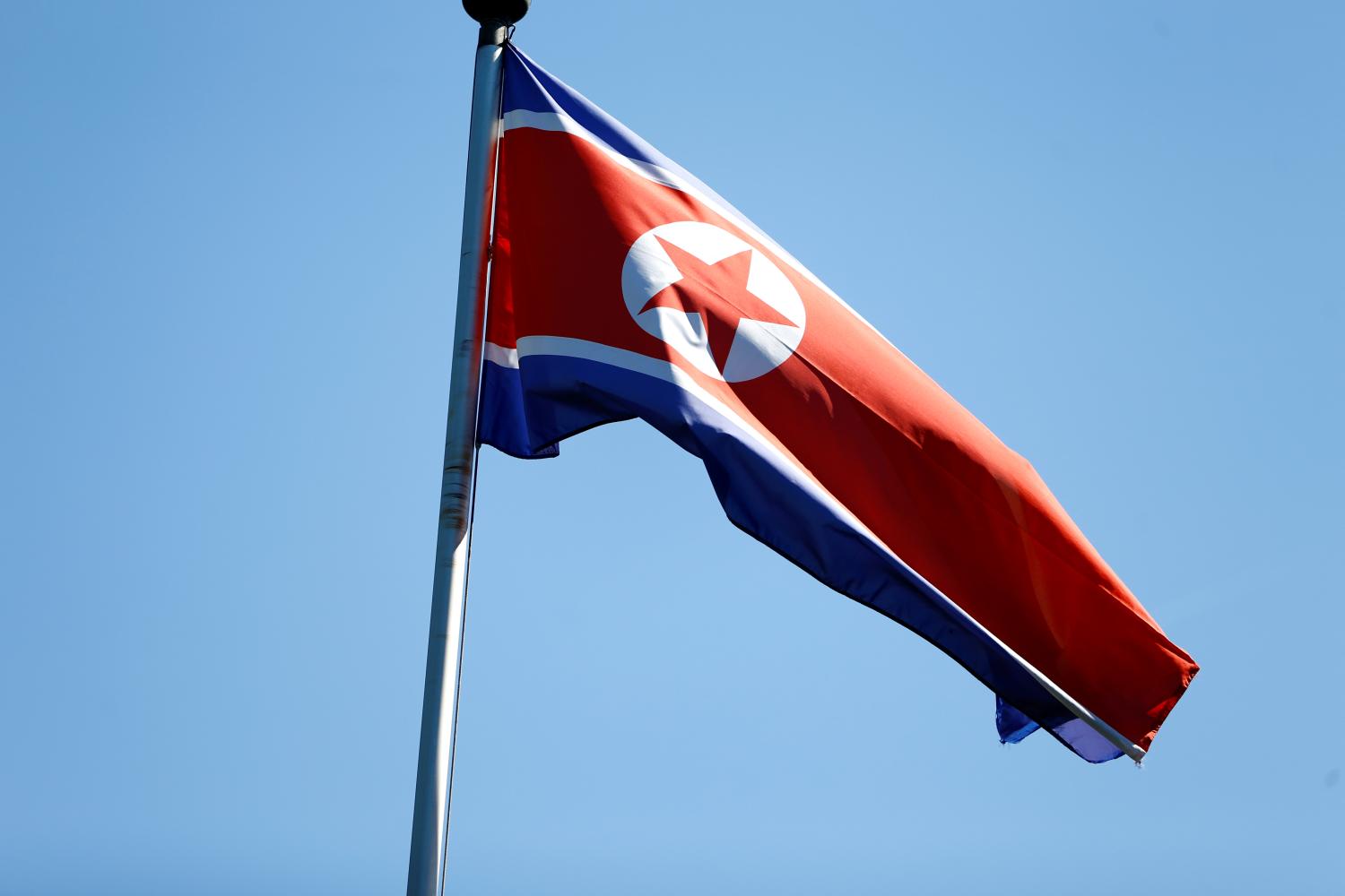 The flag of North Korea is seen in Geneva, Switzerland, June 20, 2017. REUTERS/Pierre Albouy - RC1217F51A80