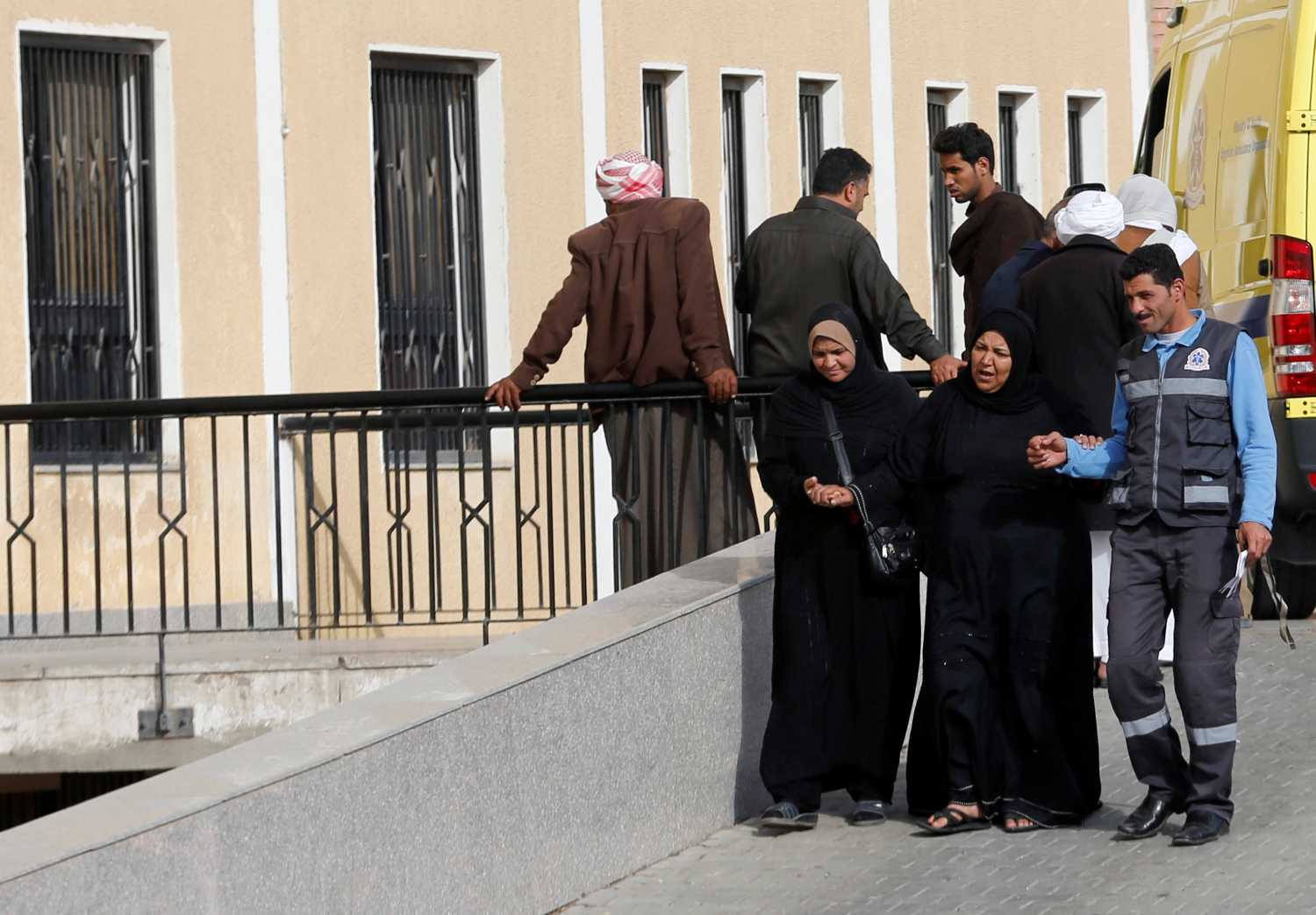 Relatives of victims of the Al Rawdah mosque explosion, cry after leaving the Suez Canal University hospital in Ismailia, Egypt November 25, 2017. REUTERS/Amr Abdallah
