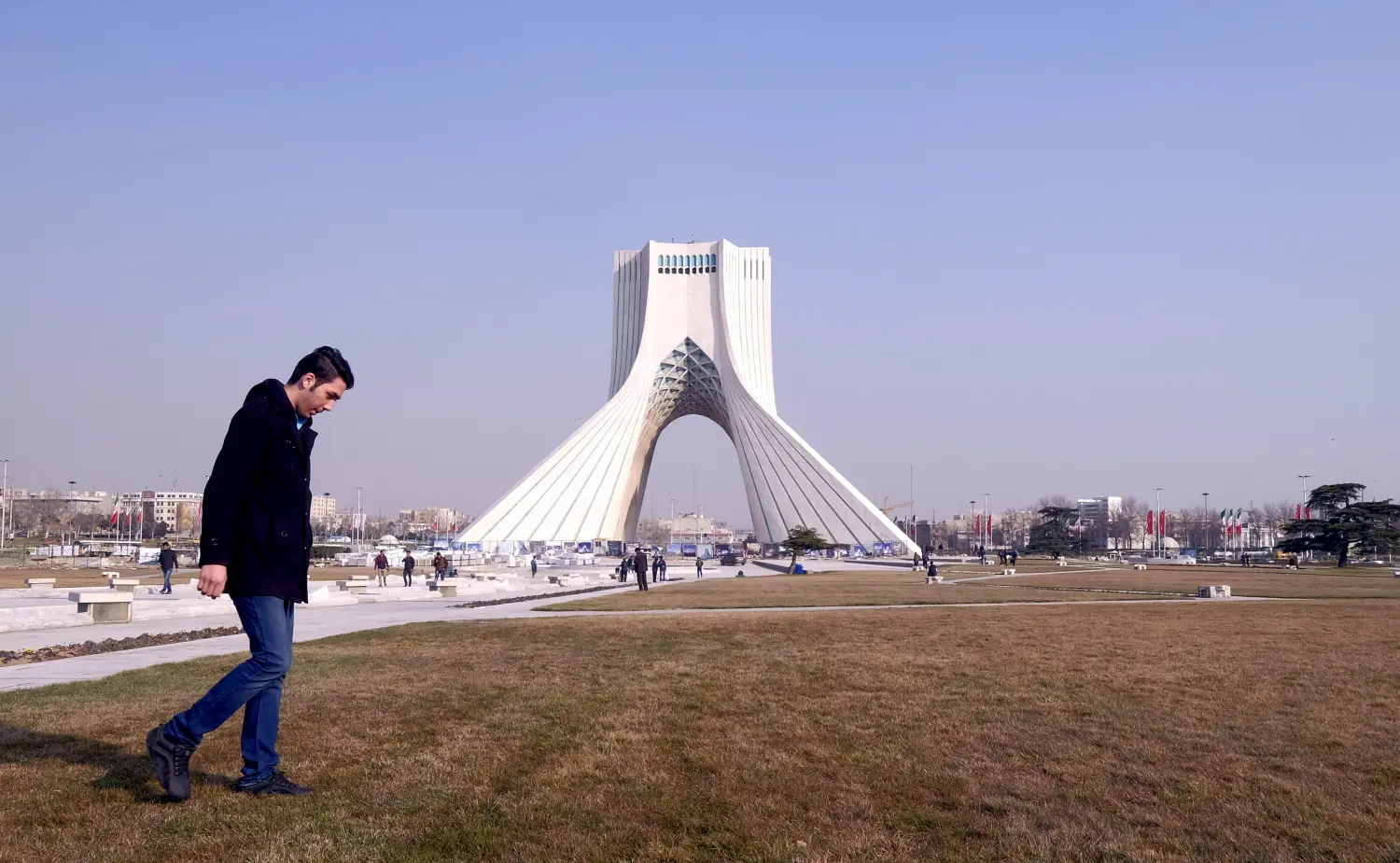 A man walks past Azadi Tower (Liberty Tower) in Azadi Square in Tehran, Iran, January 17, 2016. REUTERS/Raheb Homavandi/