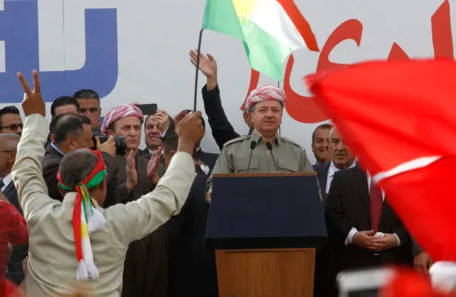Iraqi Kurdish President Masoud Barzani speaks to the crowd while attending a rally to show their support for the upcoming September 25th independence referendum in Sulaimania