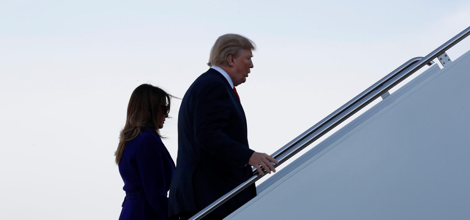 U.S. President Donald Trump and first lady Melania Trump arrive to board Air Force One for travel to Hawaii, on his way to an extended trip to five countries in Asia, from Joint Base Andrews, Maryland, U.S. November 3, 2017. REUTERS/Jonathan Ernst - RC19F9D5D540