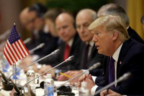 President Donald Trump, right, speaks in a bilateral meeting with Vietnamese President Tran Dai Quang (not in picture), at the Presidential Palace, Sunday Nov. 12, 2017, in Hanoi, Vietnam during his state visit to the country. REUTERS/Na Son Nguyen/Pool - RC177326C5D0