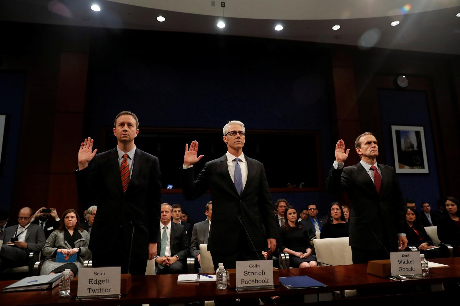 Twitter Acting General Counsel Sean Edgett, Facebook General Counsel Colin Stretch and Google Senior Vice President and General Counsel Kent Walker are sworn in before the House Intelligence Committee to answer questions related to Russian use of social media to influence U.S. elections, on Capitol Hill in Washington, U.S., November 1, 2017. REUTERS/Aaron P. Bernstein - RC16D2B0FBC0