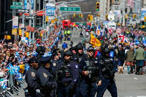 Members of the New York Police Department's Counterterrorism Bureau stand watch as people take part during the Annual Tartan Day Parade in New York, U.S. April 8, 2017. REUTERS/Eduardo Munoz - RC1447601E80