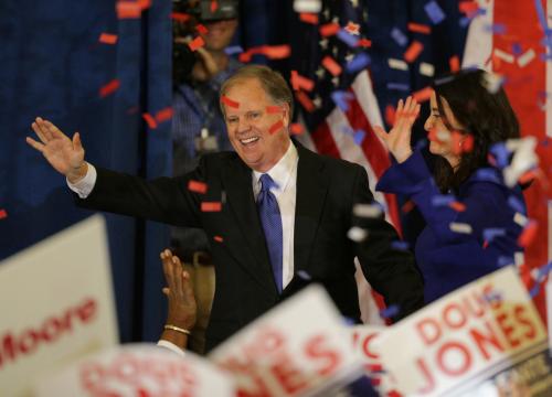 Democratic Alabama U.S. Senate candidate Doug Jones and wife Louise acknowledge supporters at the election night party in Birmingham, Alabama, U.S., December 12, 2017. REUTERS/Marvin Gentry - RC16B4B41EA0