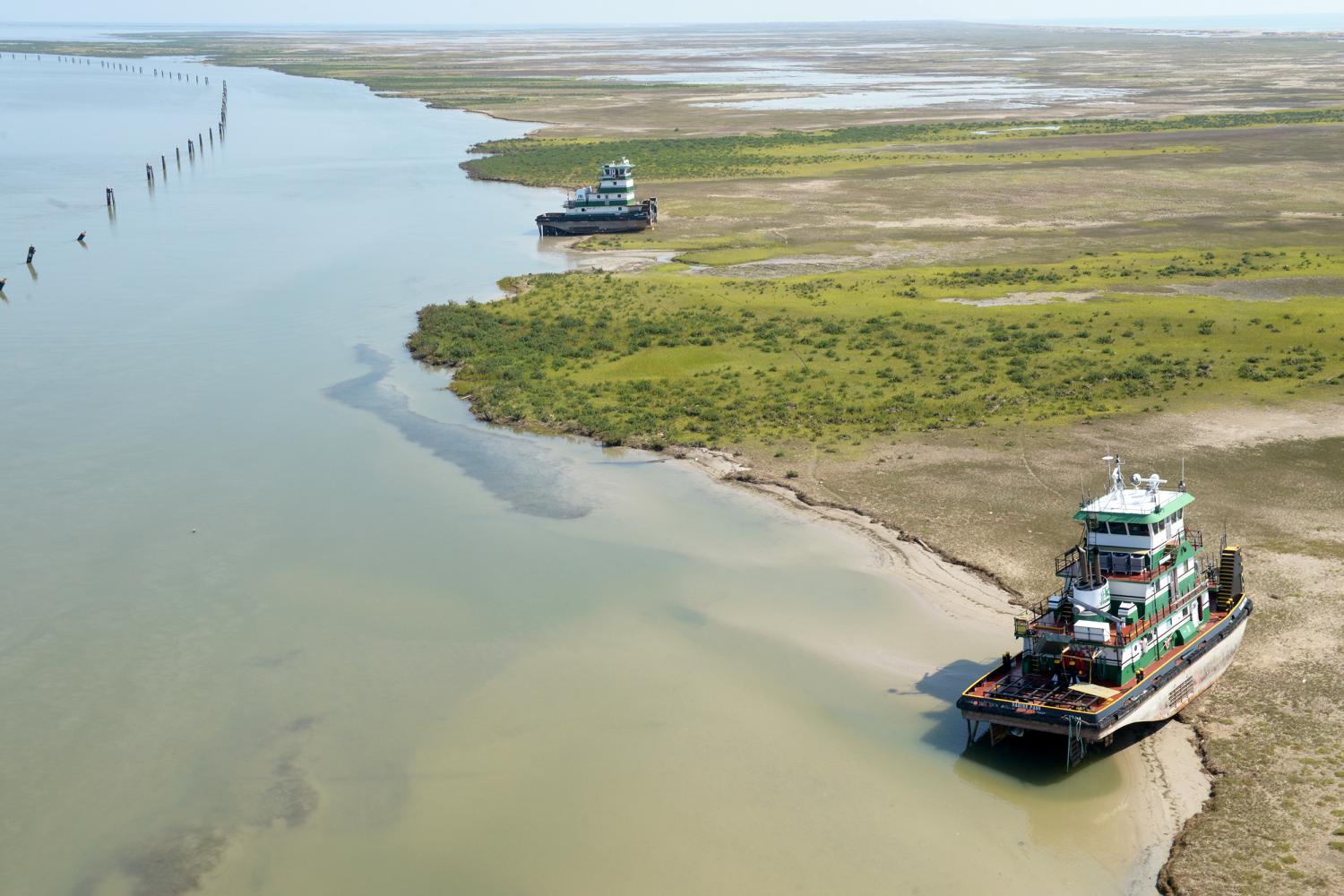 Vessels rest on the bank after running aground during Hurricane Harvey.