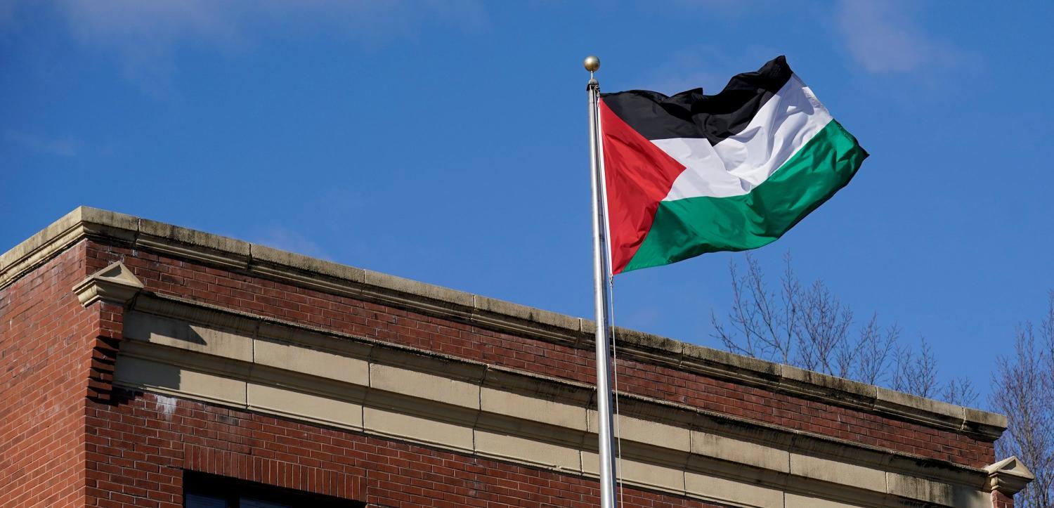 Palestinian flag waves at Palestine Liberation Organization office in Washington, U.S., November 19, 2017. U.S. State Department official said that under legislation passed by Congress, Secretary of State Rex Tillerson could not renew a certification that expired this month for the PLO office. REUTERS/Yuri Gripas - RC1F816A3400