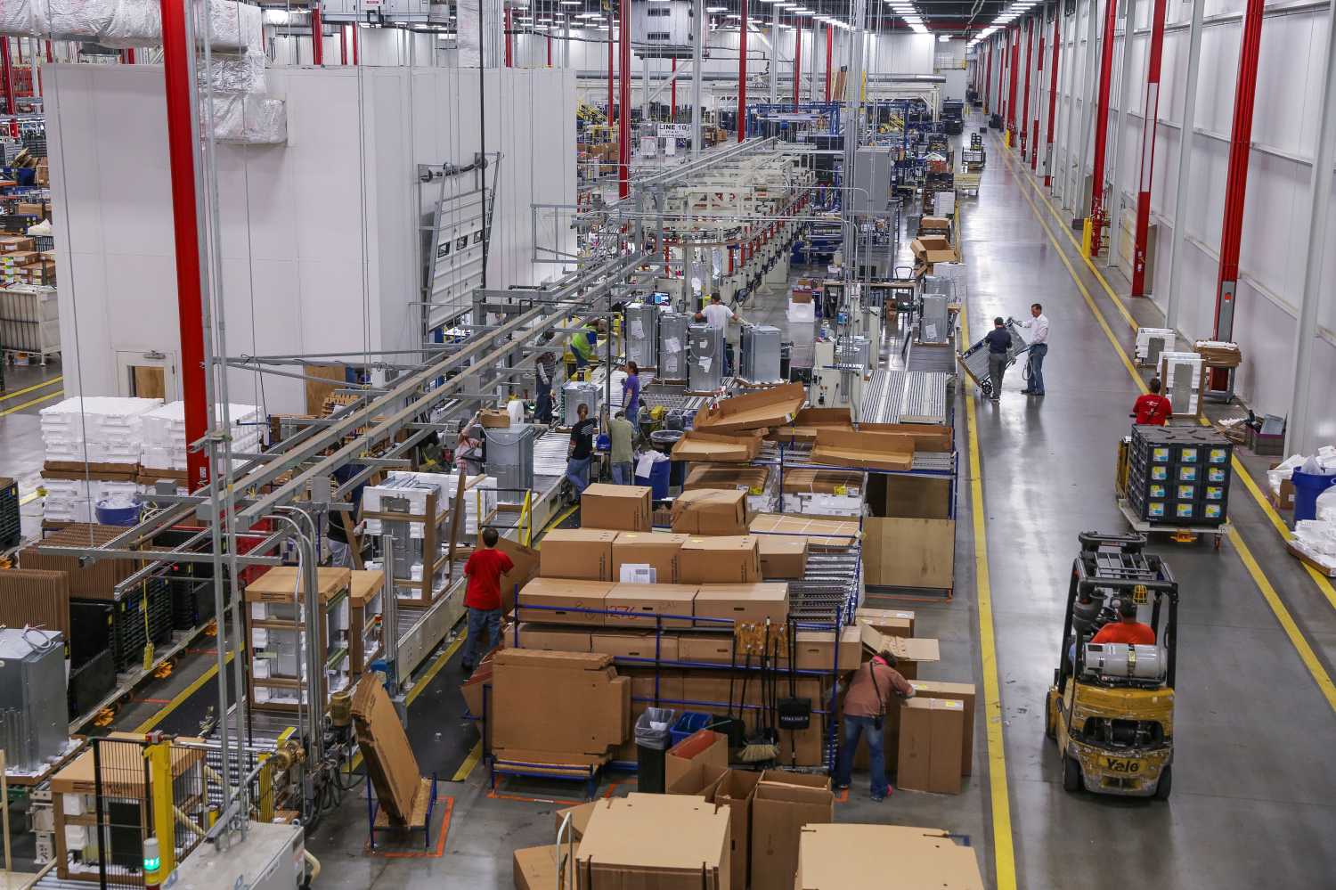 Workers assemble built-in appliances at the Whirlpool manufacturing plant in Cleveland