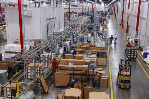 Workers assemble built-in appliances at the Whirlpool manufacturing plant in Cleveland