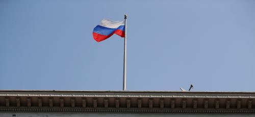 The Russian flag waves in the wind on the rooftop of the Consulate General of Russia in San Francisco, California, U.S., September 2, 2017. REUTERS/Stephen Lam - RC1687F46500