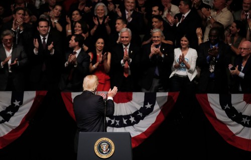 U.S. President Trump reacts to the cheers of the crowd after he announced his new Cuba policy during speech in Miami