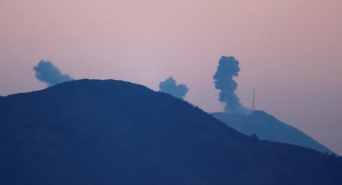 Smoke rises from the Syria's Afrin region, as it is pictured from near the Turkish town of Hassa, on the Turkish-Syrian border in Hatay province, Turkey January 20, 2018. REUTERS/Osman Orsal - RC11FDBEAC00