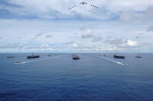 The USS Nimitz, USS Kitty Hawk and USS John C. Stennis Carrier Strike Groups transit in formation during a joint photo exercise during exercise Valiant Shield 2007 in the Pacific Ocean in this August 14, 2007 handout photo. The aerial formation consists of aircraft from the carrier strike groups as well as Air Force aircraft. Mass Communication Specialist Seaman Stephen W. Rowe/U.S. Navy/Handout via REUTERS ATTENTION EDITORS - THIS IMAGE WAS PROVIDED BY A THIRD PARTY. - RC1BE2E09CE0