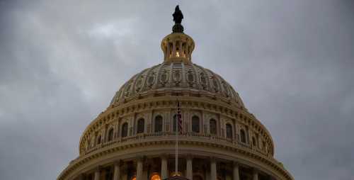 The U.S. Capitol building is lit at dusk ahead of planned votes on tax reform in Washington, U.S., December 18, 2017. REUTERS/Joshua Roberts - RC1E477B1960