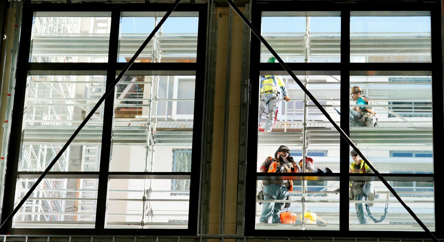 Workers at the Gaylord Rockies Resort & Convention Center under construction outside Denver, Colorado U.S.