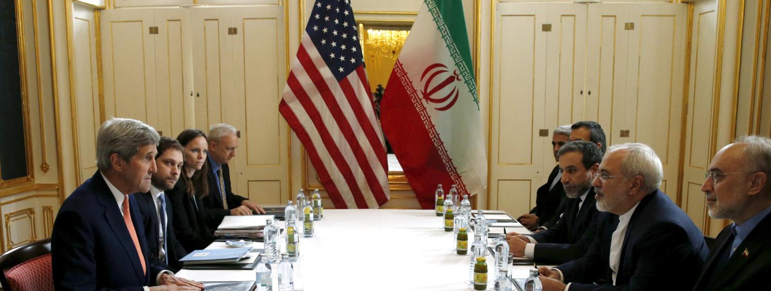 U.S. Secretary of State John Kerry (L) meets with Iranian Foreign Minister Mohammad Javad Zarif on what is expected to be "implementation day," the day the International Atomic Energy Agency (IAEA) verifies that Iran has met all conditions under the nuclear deal, in Vienna January 16, 2016. REUTERS/Kevin Lamarque - GF20000096874