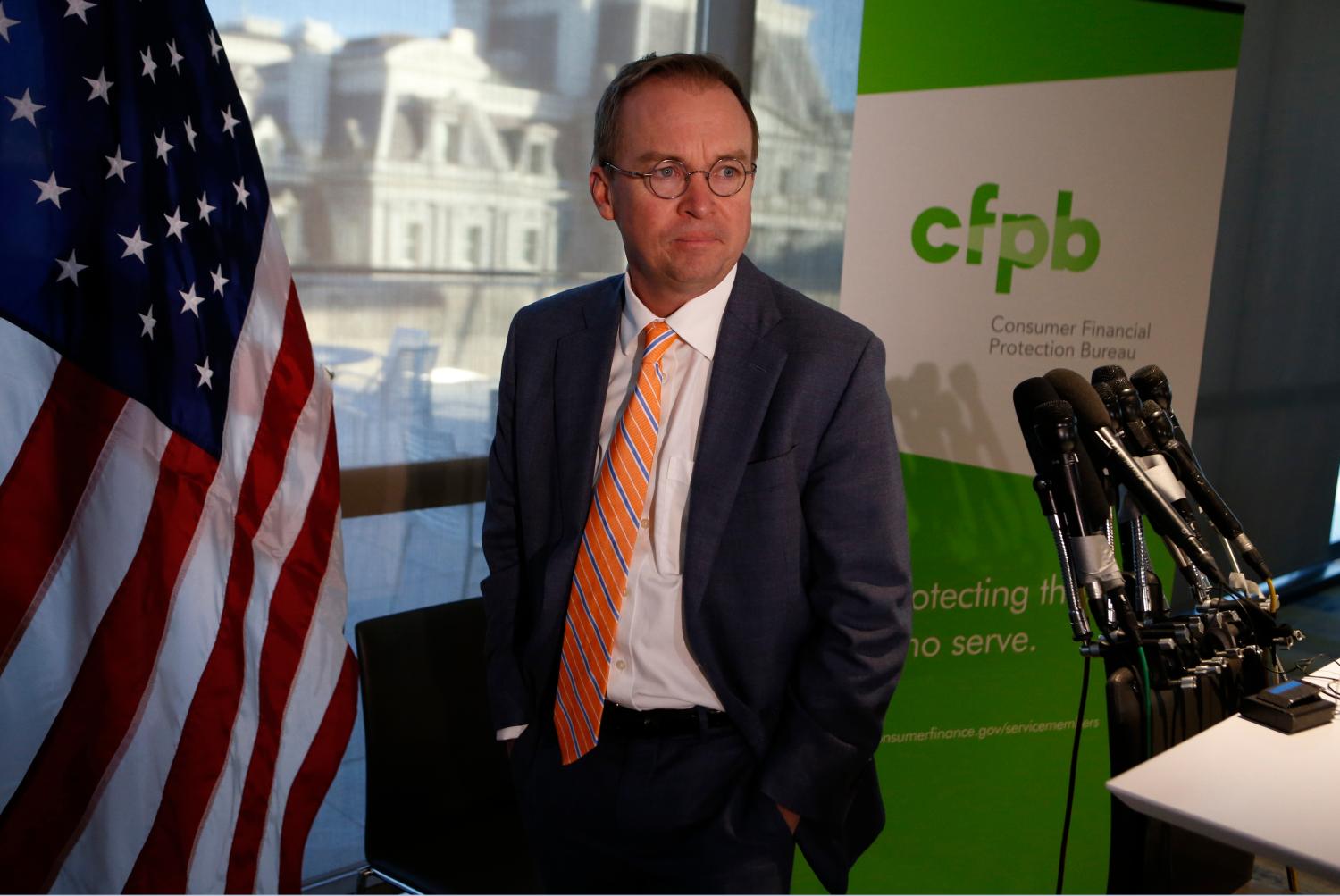 Office of Management and Budget (OMB) Director Mick Mulvaney arrives to speak to the media at the U.S. Consumer Financial Protection Bureau (CFPB), where he began work earlier in the day after being named acting director by U.S. President Donald Trump in Washington November 27, 2017. REUTERS/Joshua Roberts - HP1EDBR1N1A0D