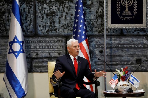 U.S. Vice President Mike Pence speaks during a meeting at Israeli President Reuven Rivlin's residence in Jerusalem January 23, 2018. REUTERS/Ronen Zvulun - RC1F5FED8AF0