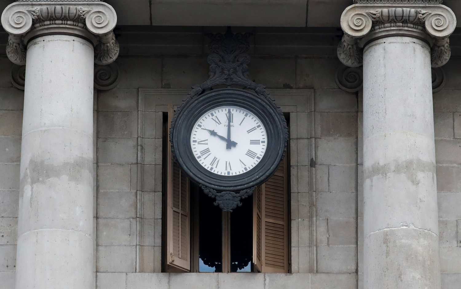 A clock in Sant Jaume square is seen at ten o'clock.