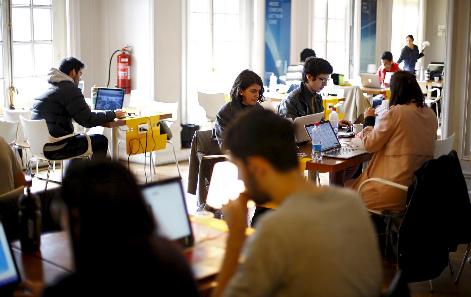 Participants of the "Start Up Chile" program work at their headquarters in Santiago