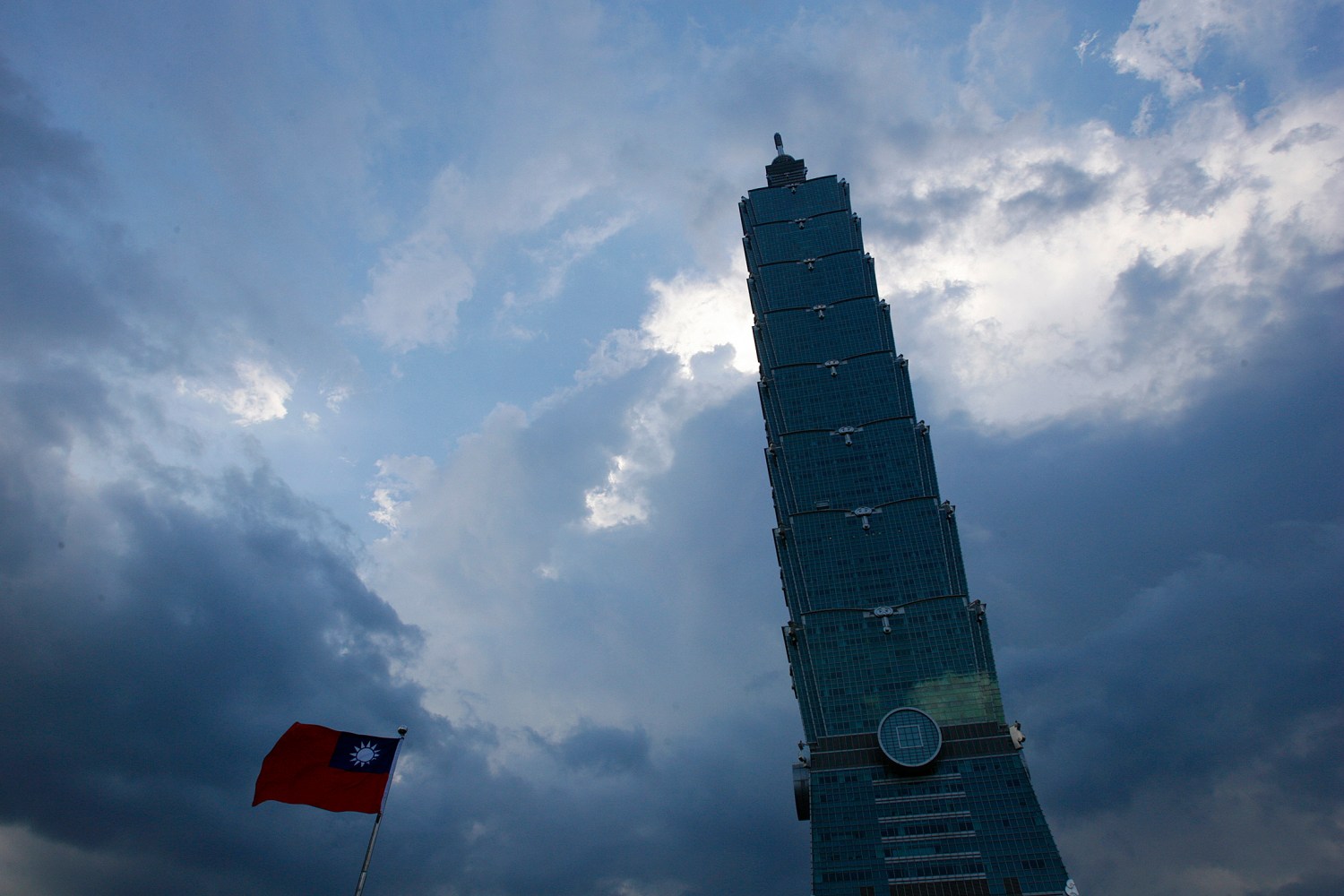 A Taiwan flag is hung beside the Taipei 101 building in Taipei.