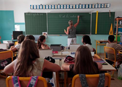 Elementary school children are seen in a classroom on the first day of class in the new school year in Nice, September 3, 2013.