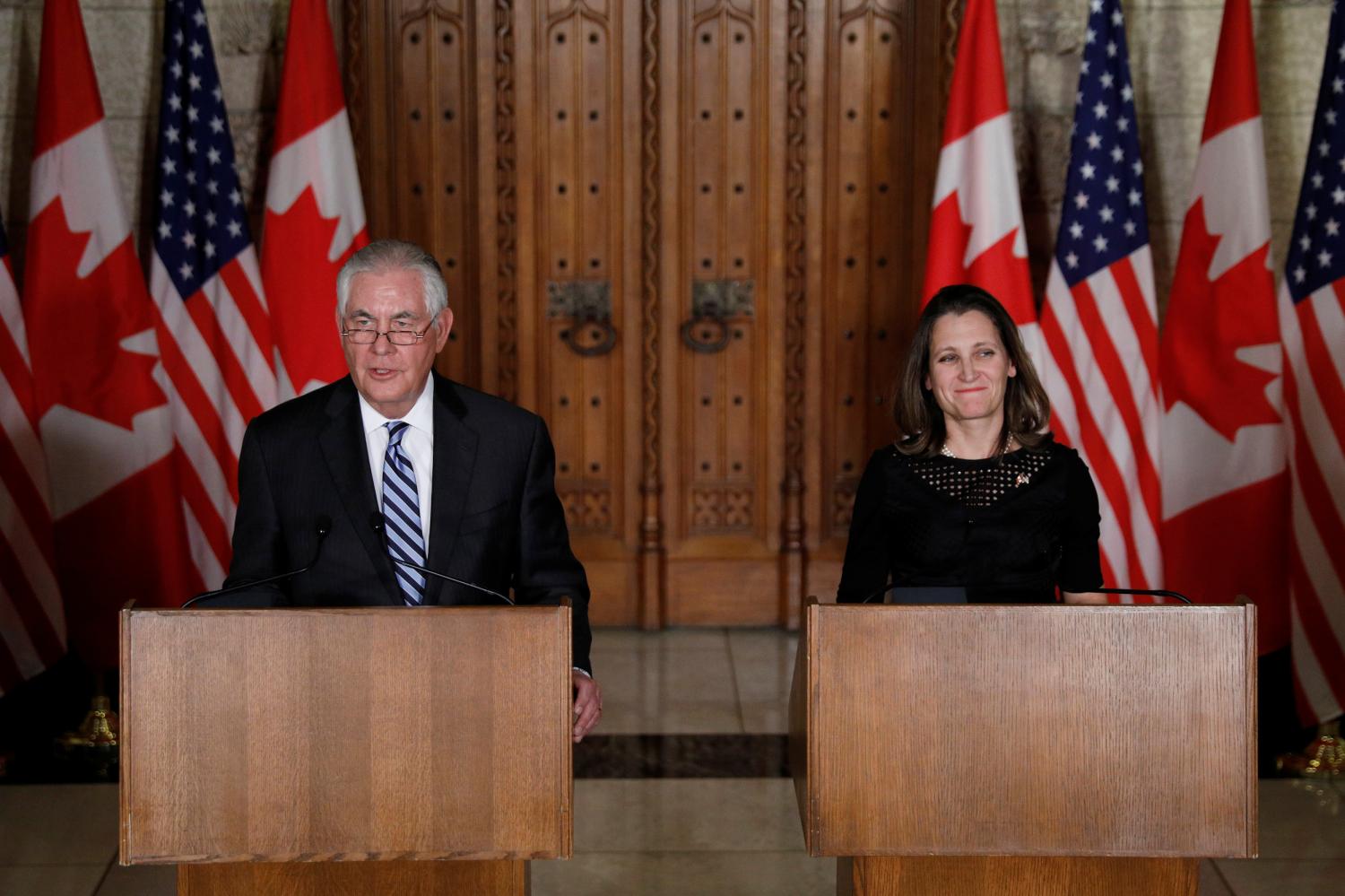 U.S. Secretary of State Rex Tillerson (L) and Canada's Foreign Minister Chrystia Freeland take part in a news conference on Parliament Hill in Ottawa, Ontario, Canada, December 19, 2017. REUTERS/Blair Gable - RC122CAB46E0