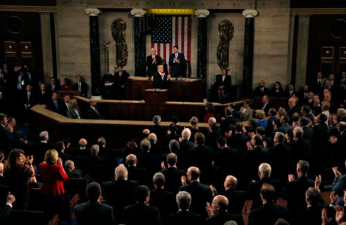 U.S. President Donald Trump applauds as he delivers his State of the Union address to a joint session of the U.S. Congress on Capitol Hill in Washington, U.S. January 30, 2018. REUTERS/Leah Millis - HP1EE1V0AAV0R