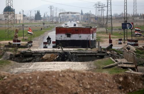 A checkpoint held by Syrian forces loyal to President Bashar al-Assad is pictured in Aleppo, Syria February 10, 2018. REUTERS/Omar Sanadiki TPX IMAGES OF THE DAY - RC14E1387B70