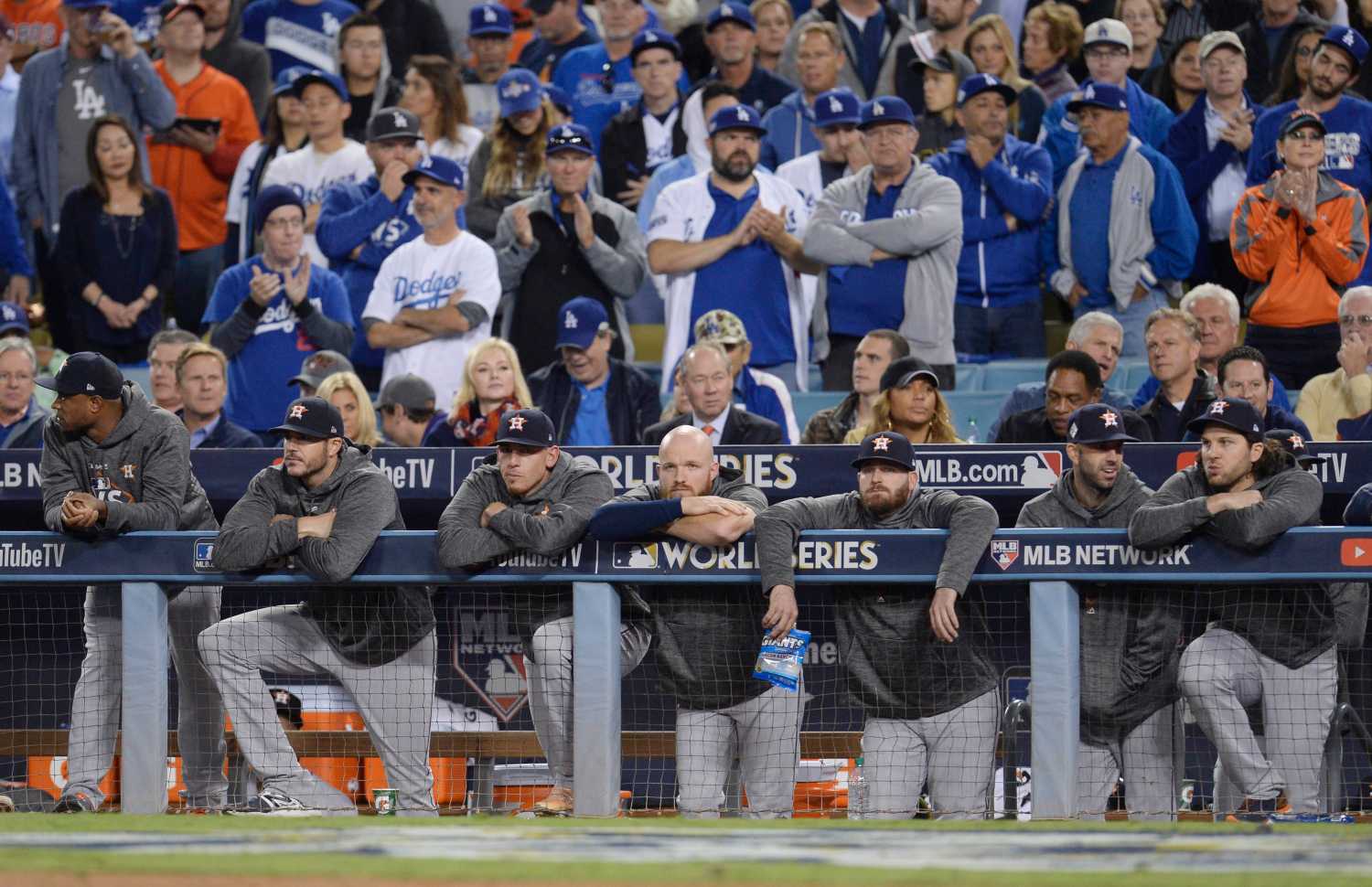 Oct 31, 2017; Los Angeles, CA, USA; Houston Astros players look out from the dugout in the 9th inning against the Los Angeles Dodgers in game six of the 2017 World Series at Dodger Stadium. Mandatory Credit: Gary A. Vasquez-USA TODAY Sports - 10384562