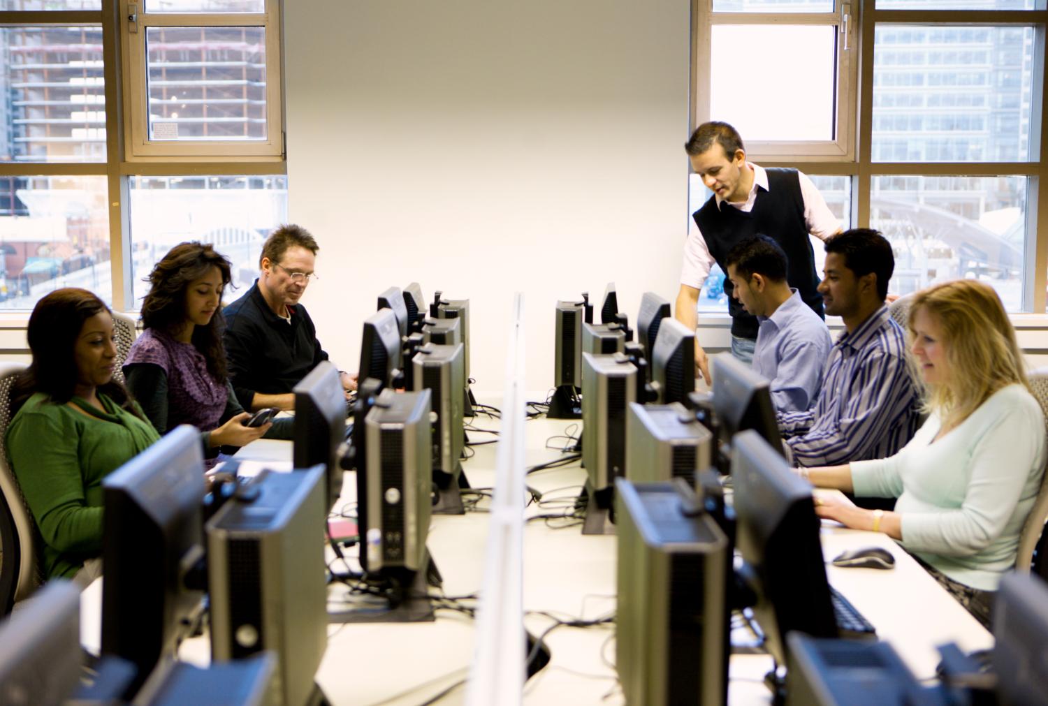 mature students working in a computer laboratory