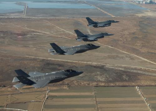 U.S. Air Force F-16 Fighting Falcons and F-35 Lightning IIs participate in a training mission near Kunsan Air Base in preparation for VIGILANT ACE 18 in South Korea on December 1, 2017 in this U.S. Air Force photo and made available on December 5, 2017. Picture taken on December 1, 2017. Courtesy Josh Rosales/U.S. Air Force/Handout via REUTERS ATTENTION EDITORS - THIS IMAGE HAS BEEN SUPPLIED BY A THIRD PARTY. - RC128F537DD0