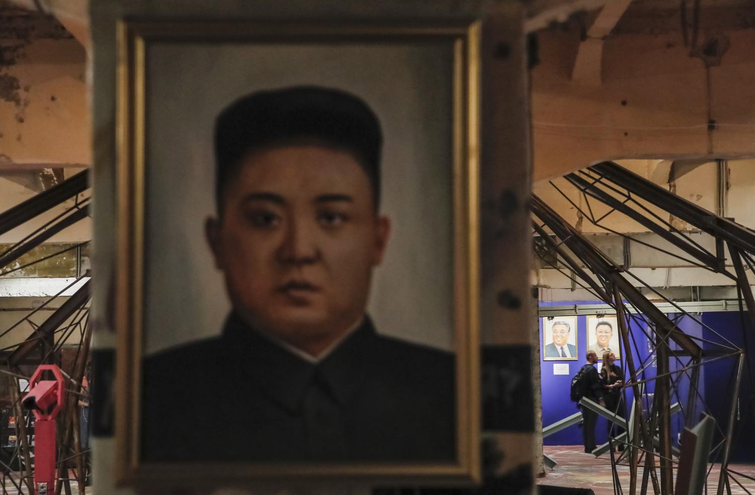 Portraits of North Korean leaders Kim Jong Un, Kim Il-sung and Kim Jong-il are on display at the "Made In North Korea" exhibition held at the UMAM museum in Moscow, Russia January 20, 2018. REUTERS/Maxim Shemetov